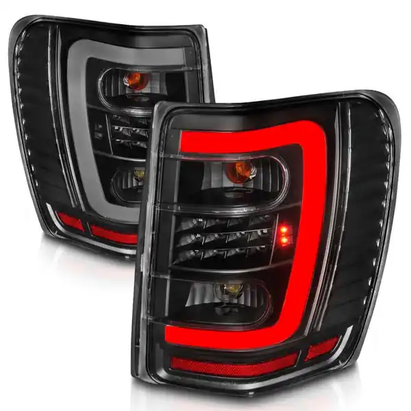 ANZO 1999-2004 Jeep Grand Cherokee LED Tail Lights w/ Light Bar Black Housing Clear Lens